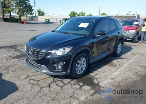2016 Mazda Cx-5 Touring z USA, uszkodzony, nr VIN JM3KE2CY6G0911717